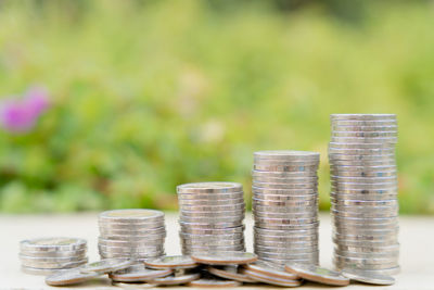 Stack of coins on table