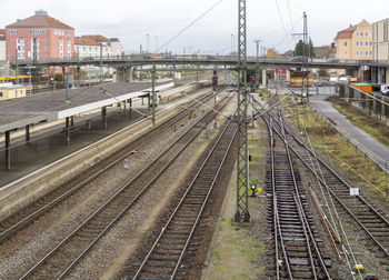 High angle view of railroad tracks in city against sky