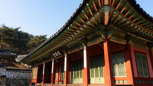 Low angle view of temple building against sky