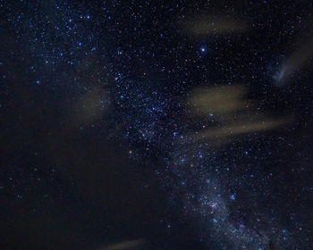 Low angle view of stars in sky at night