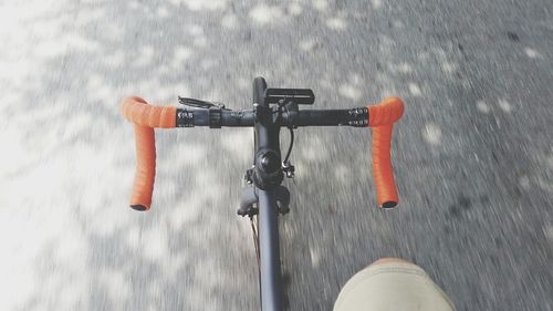 Man riding bicycle on street