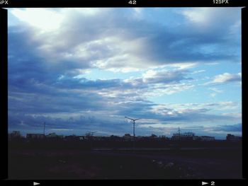 View of road against cloudy sky