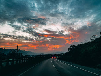 Road against sky during sunset