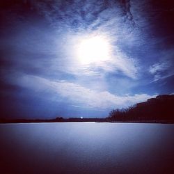 Reflection of clouds in calm lake