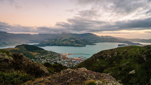 Scenic view of lake against sky during sunset