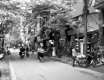 People walking on road in city