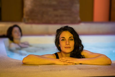 Portrait of woman in hot tub