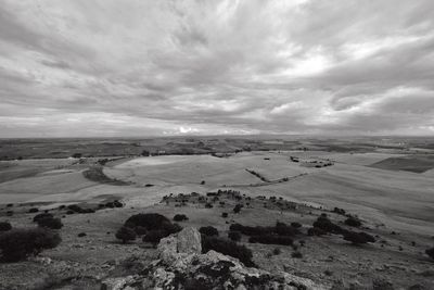 Scenic view of land against sky