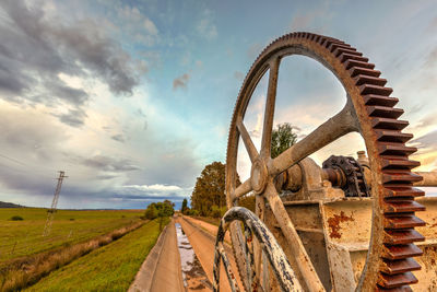 Panoramic shot of agricultural field against sky