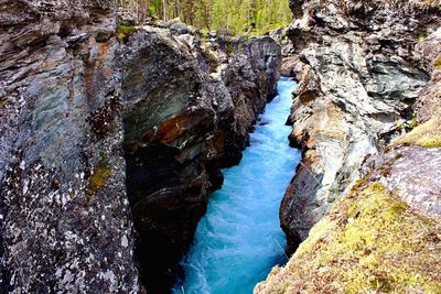 High angle view of rock formations in river