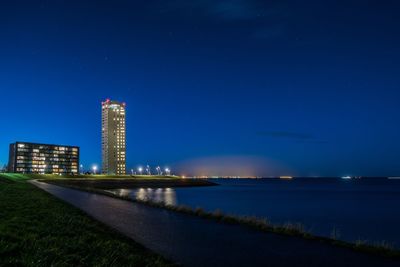 View of illuminated city at night