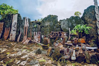 Panoramic shot of trees and rocks against sky