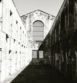 Corridor of building against clear sky