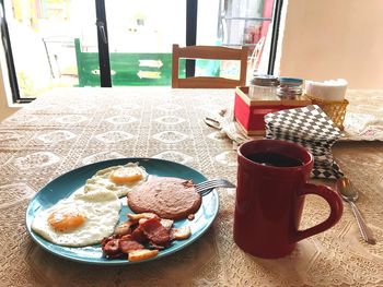 Close-up of breakfast served on table