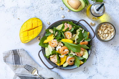 High angle view of fruits in bowl on table