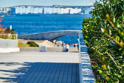 Park by the sea against sky