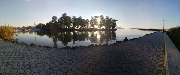 Reflection of trees in calm lake