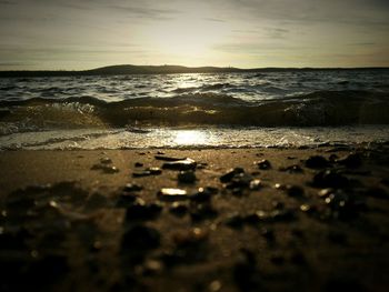 Scenic view of sea at sunset