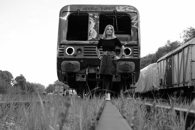 Train on railroad track against sky