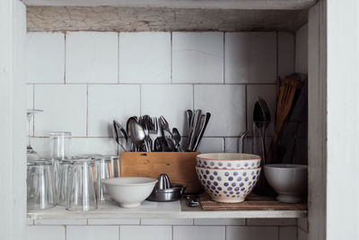 Crockeries in shelf at home