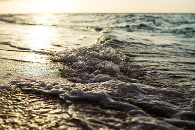 Close-up of wave on beach