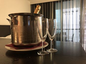 Close-up of beer glass on table
