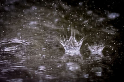 Full frame shot of water drops on lake