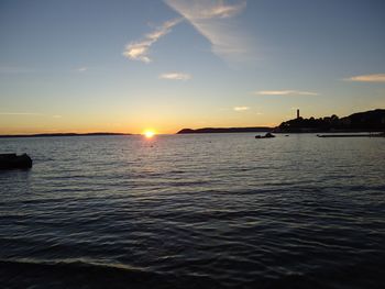 Scenic view of sea against sky during sunset