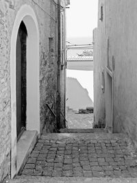 Entrance of old building against sky