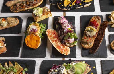 Variety of creative sandwiches on the restaurant table