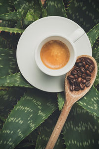 High angle view of coffee cup on table