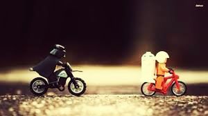 bicycle, transportation, land vehicle, mode of transport, selective focus, street, focus on foreground, riding, toy, childhood, stationary, motorcycle, cycling, side view, outdoors, parking, surface level, road