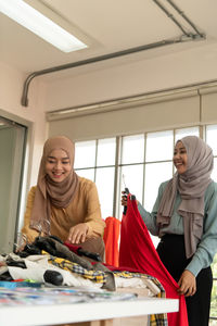 Portrait of young businesswoman working at office