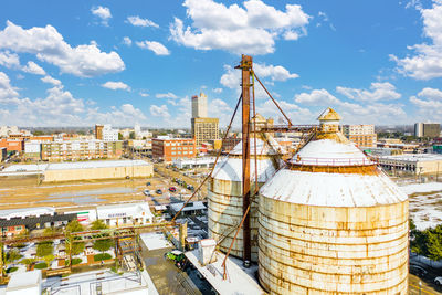 Buildings in city against sky