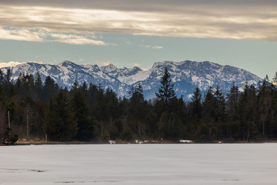 Scenic view of snowcapped mountains against sky