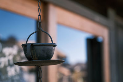 Close-up of bird feeder