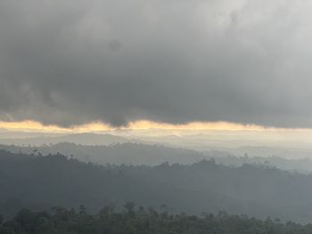 Scenic view of mountains against sky during sunset