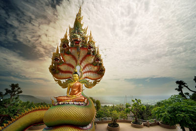 Close-up of statue against sky