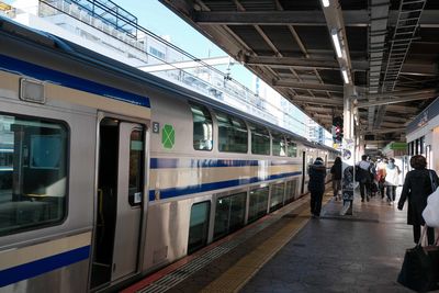 Blurred motion of train at railroad station