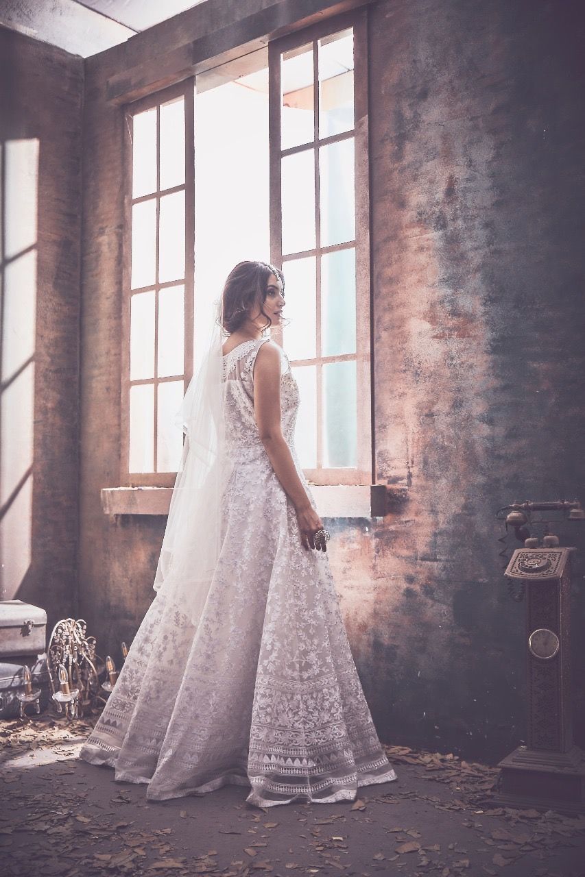 female, wedding dress, bride, adult, women, bridal clothing, fashion, celebration, window, clothing, one person, wedding, event, gown, young adult, dress, full length, indoors, newlywed, standing, emotion, life events, person, ceremony, elegance, formal wear, architecture, nature, bridal party dress, day, brown hair, contemplation, anticipation, beginnings, white, back lit, lifestyles, hairstyle, love