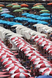 Beach umbrellas on amalfi beach. view from the top