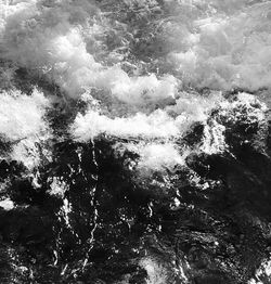 High angle view of water splashing in sea