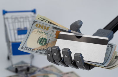 Close-up of paper currencies with text on white background