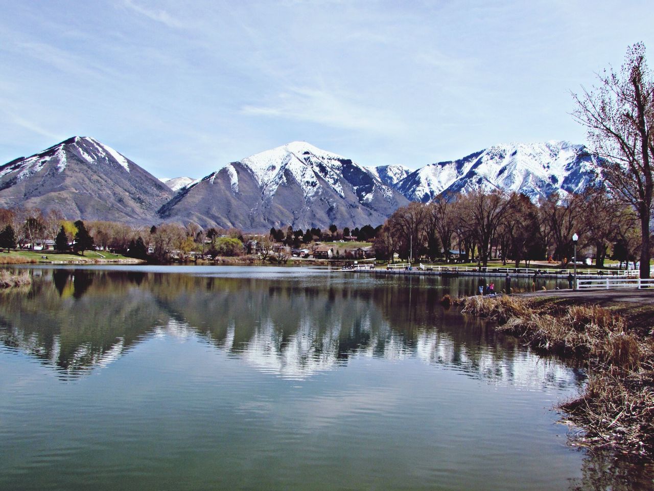 mountain, water, tranquil scene, tranquility, scenics, mountain range, lake, beauty in nature, snow, winter, nature, cold temperature, reflection, sky, tree, idyllic, non-urban scene, snowcapped mountain, day, river