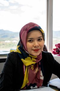 Portrait of young woman smiling