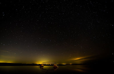 Scenic view of star field against sky at night