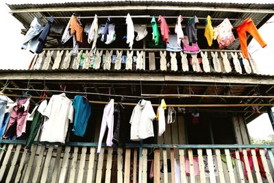 Low angle view of clothes drying in row