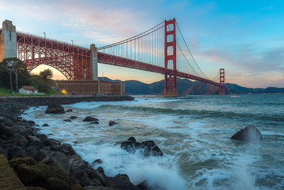 View of suspension bridge over sea