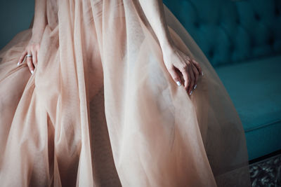 Low section of woman standing on floor