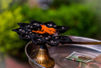 Close-up of diya 